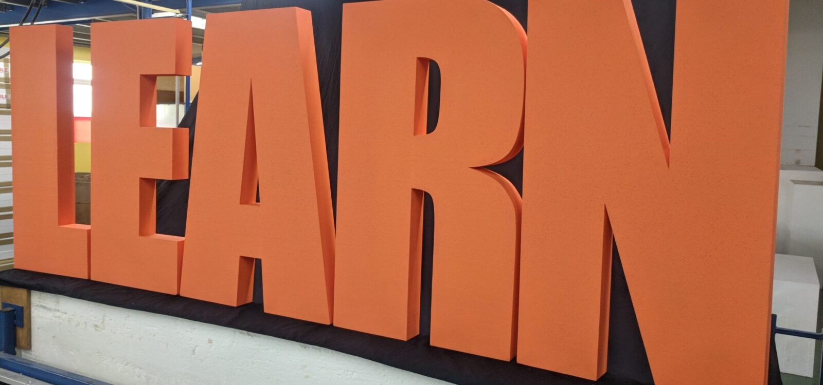 1.2m Polystyrene Learn Letters Painted Orange For A School